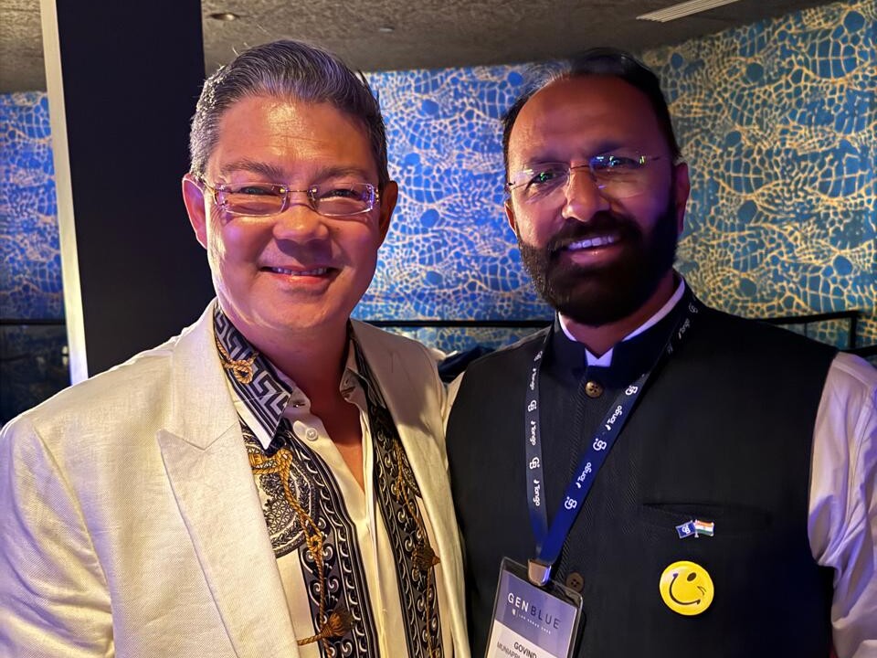 Govind Raj with a fellow realtor at an industry conference